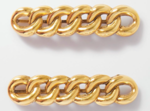 two gold-tone slides hair accessories